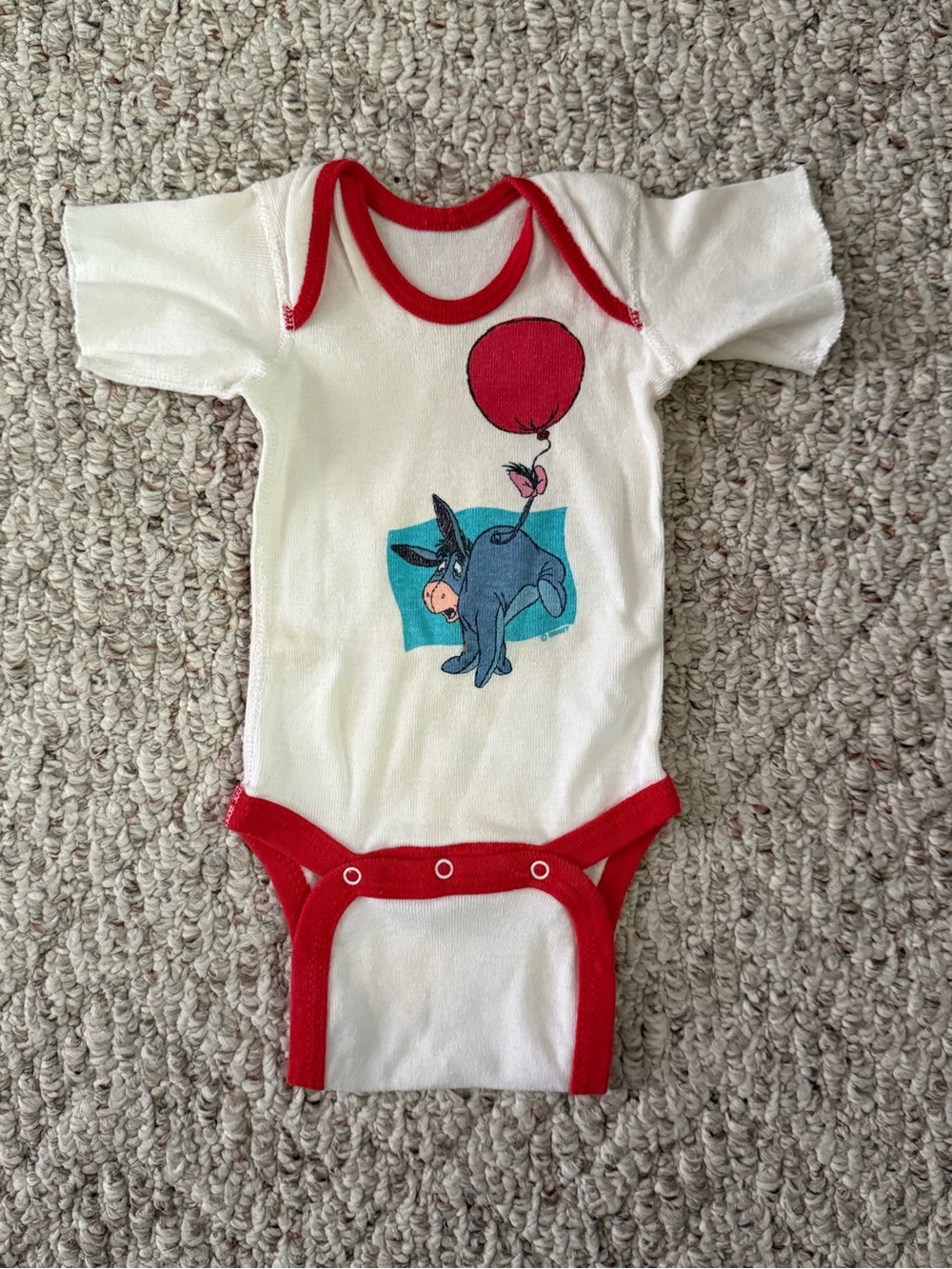 Vintage baby One-Piece Bodysuit with Red Trim and Eeyore Graphic
